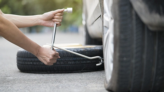 Tire change roadside assistance