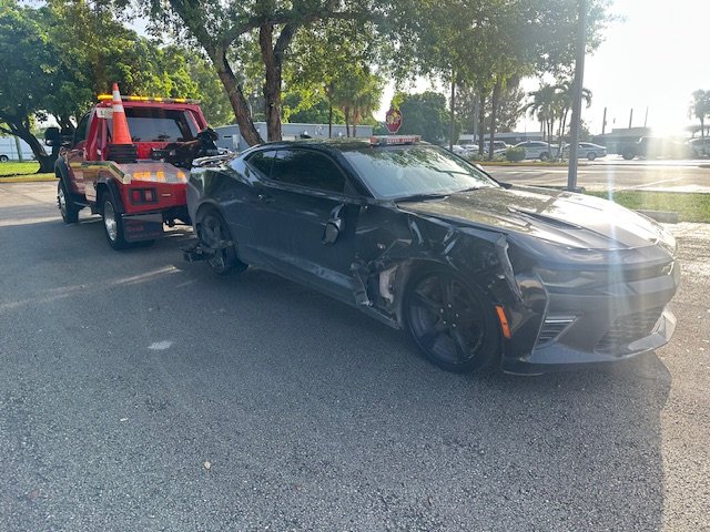 How much do towing companies charge per day?