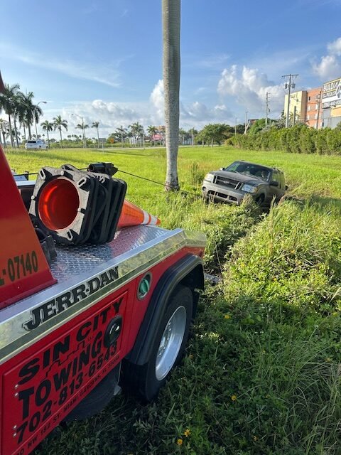What is the minimum cost for a tow?